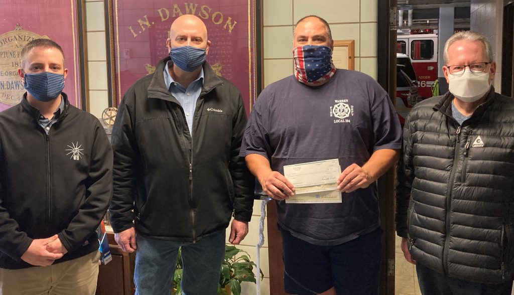 electricians presenting check