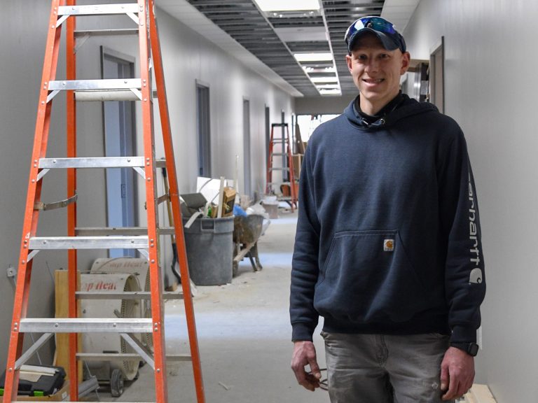 Phil Seidler stands in construction area of Heritage Manor in Youngstown.