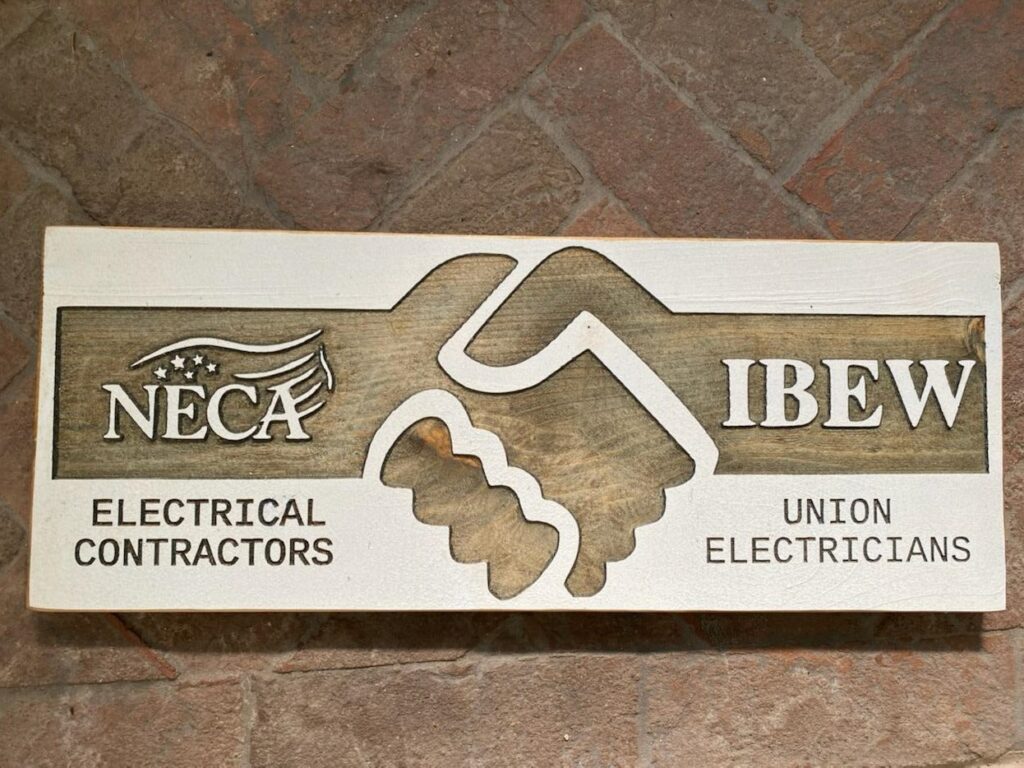 A wood sign created by Austin Lucas.