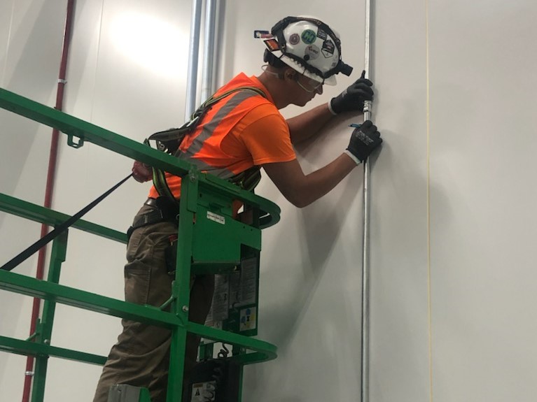 Keith Patton works in a lift.