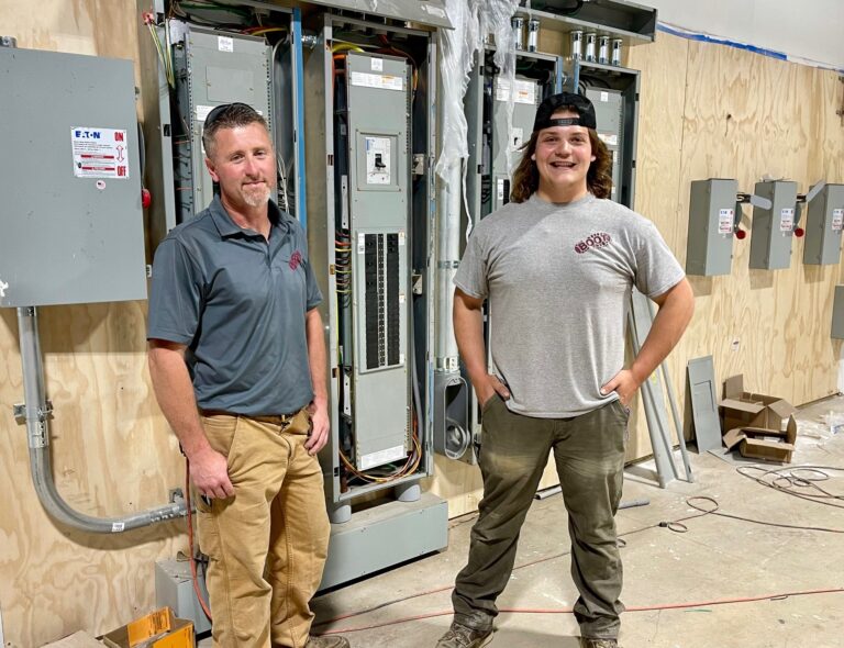 Jamie Henderson and PJ Beres, of Boot Electric, at Wedgewood Plaza renovation project.