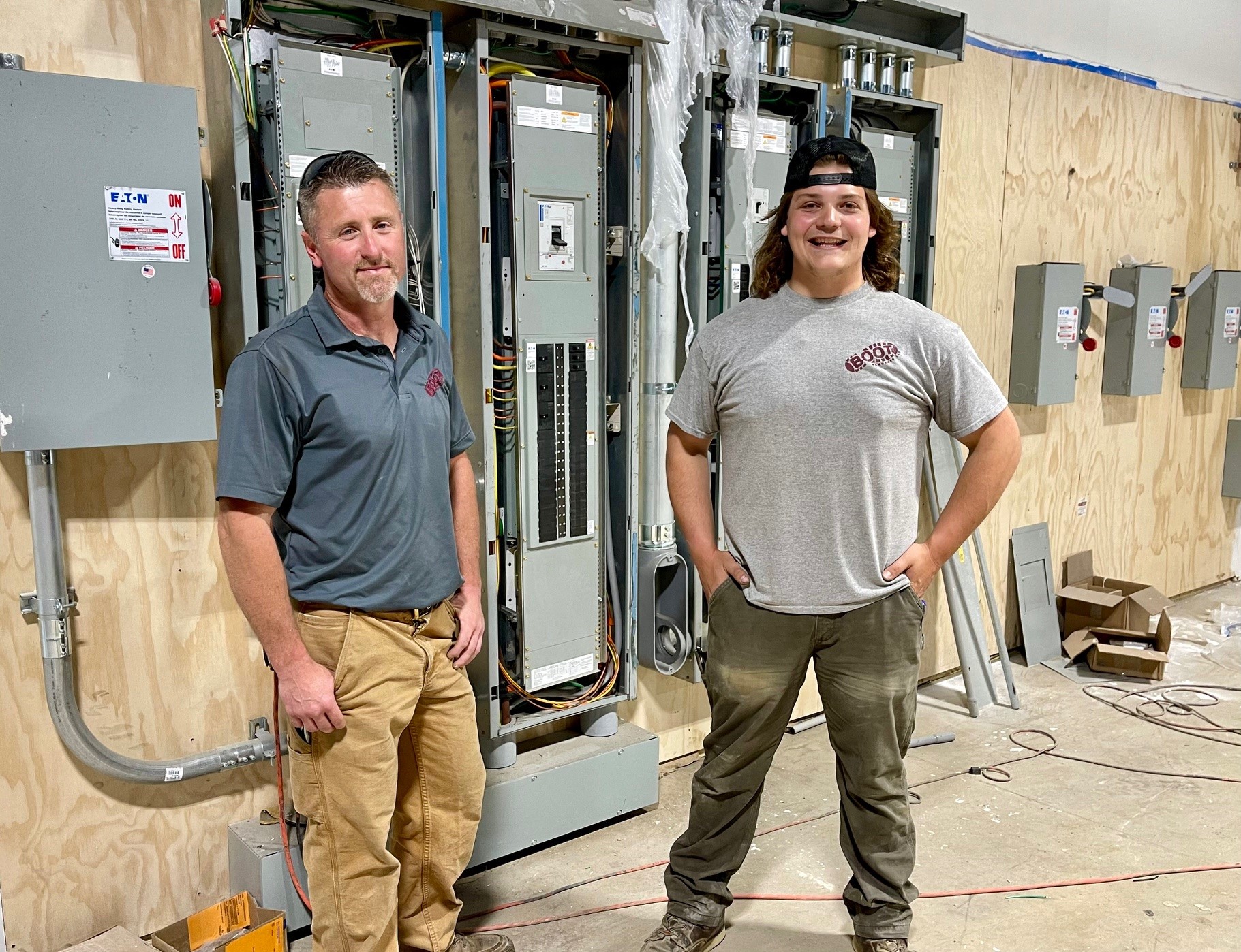 Jamie Henderson and PJ Beres, of Boot Electric, at Wedgewood Plaza renovation project.