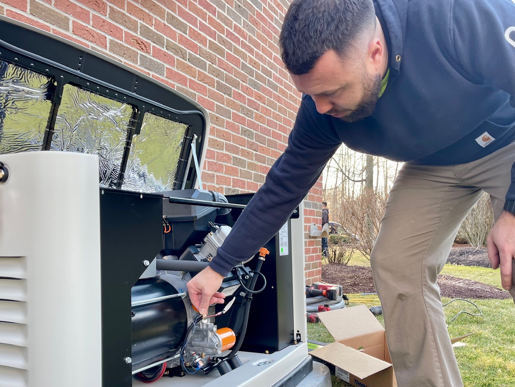 Matt Lucy, of Becdel Controls, showing home generator.