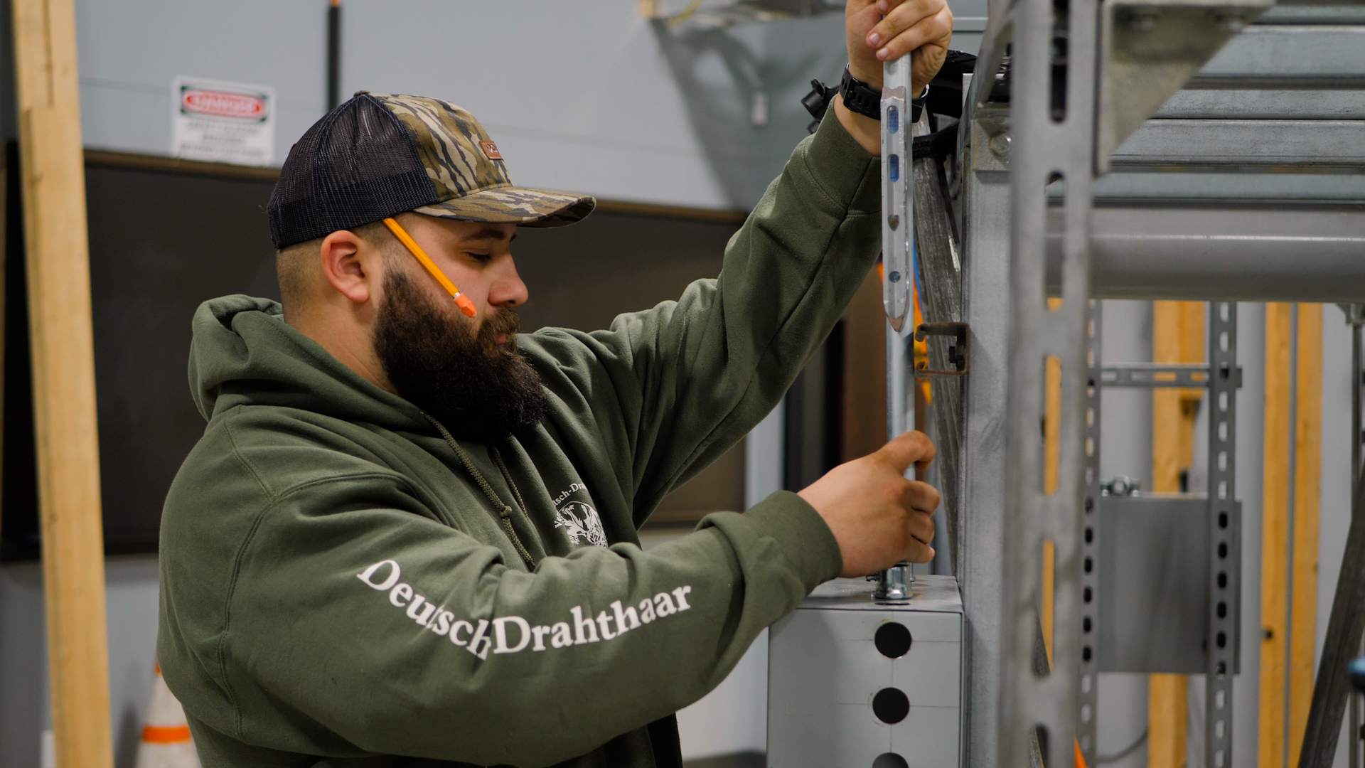 Apprentice working on wiring.