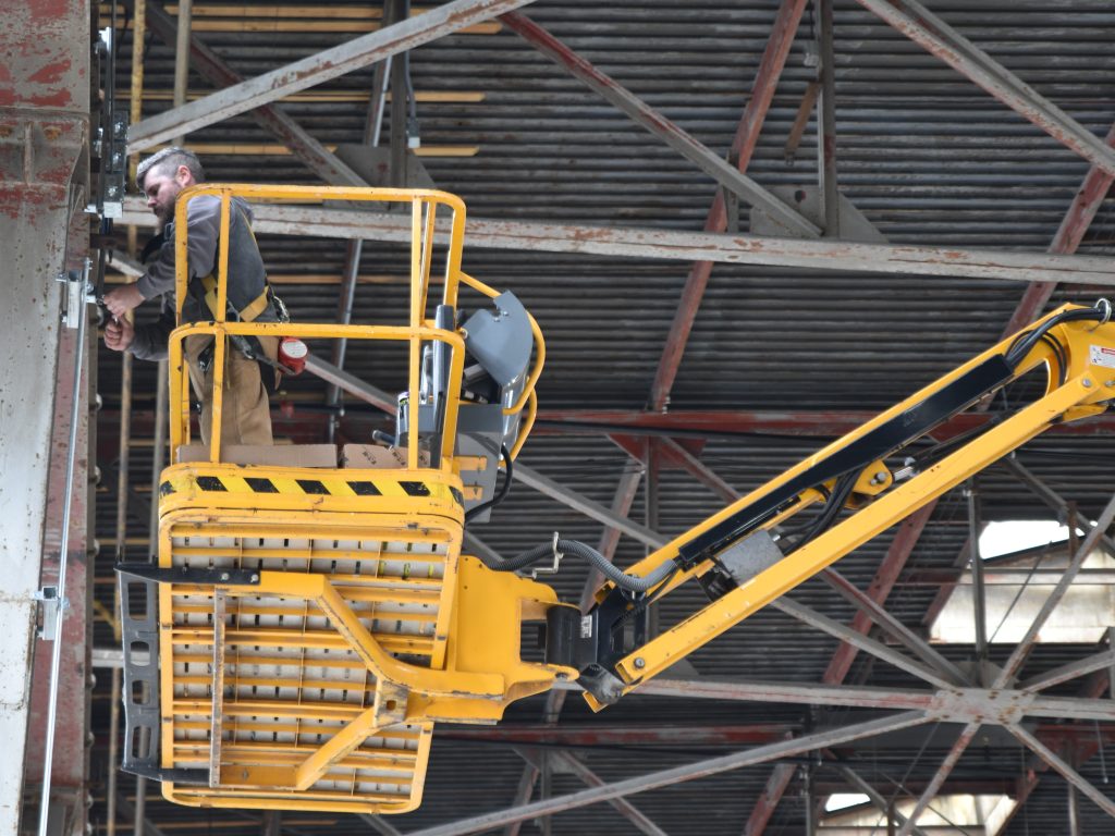 MG Electric employee James Smith works at Penguin City Brewery in Youngstown.