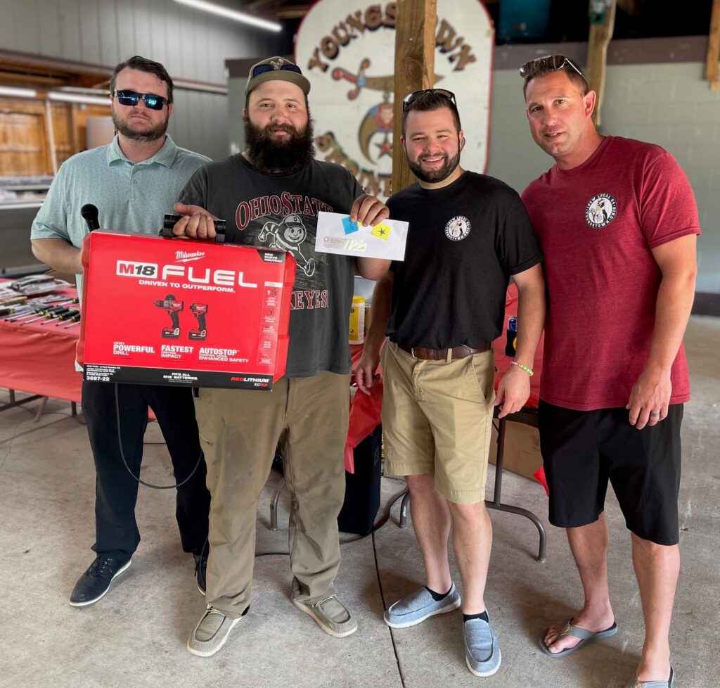 Ryan George, apprentice of the year for commercial/industrial program, with award at Local 64 picnic. Also pictured, Cody Hilliard, Ahren Peplow and Kenny Lucas.