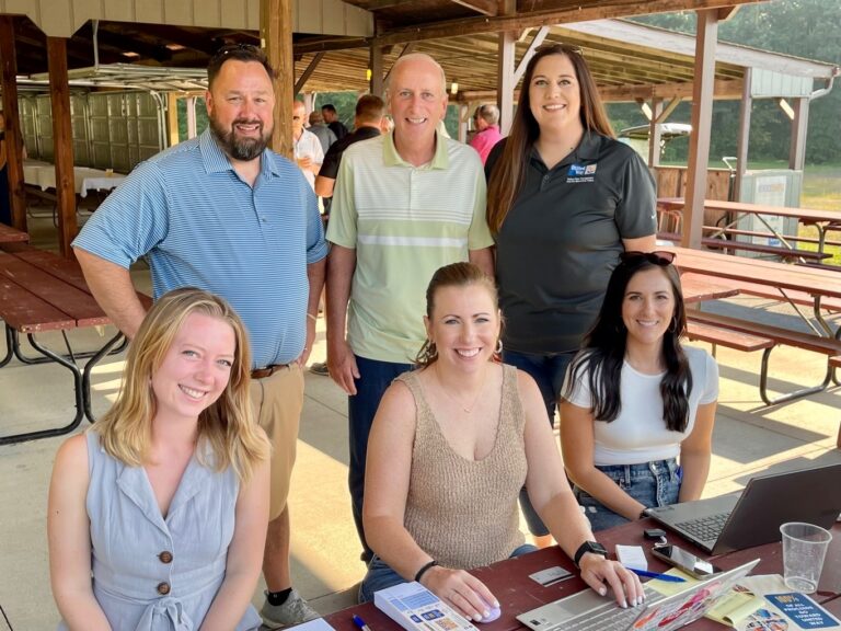 Eric Carlson, president of Joe "Dickey" Electric, with team from United Way of Youngstown and the Mahoning Valley at the reverse raffle event.